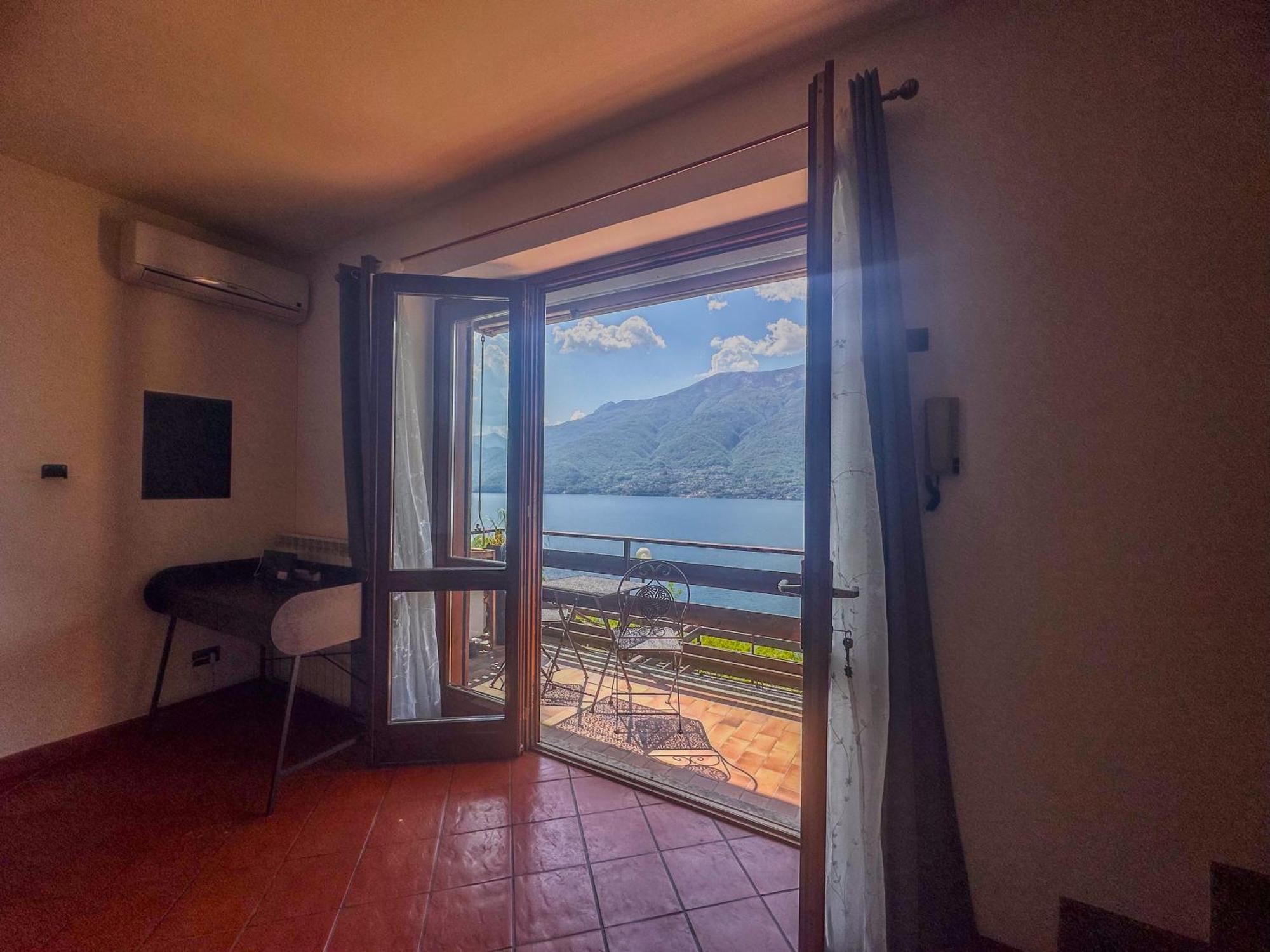 Appartamento A Due Passi Dal Lago Con Box Dorio ภายนอก รูปภาพ